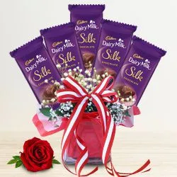 Luscious Cadbury Dairy Milk Silk Arrangement in Glass Vase  with Single Rose