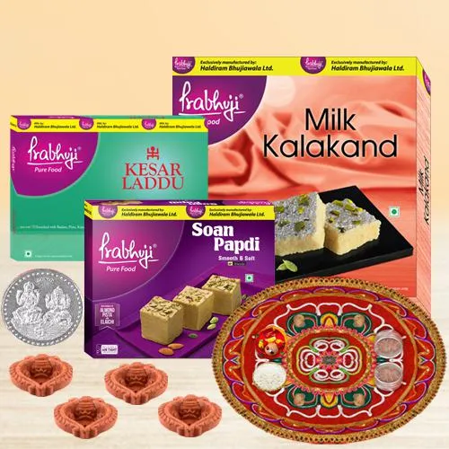 Ambrosial Gift of Haldiram Sweets with Earthen Diya N Pious Coin