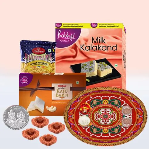 Sweets N Savory Rakhi Gift Hamper With 1kg Haldiram Rasgulla to Ranchi,  India