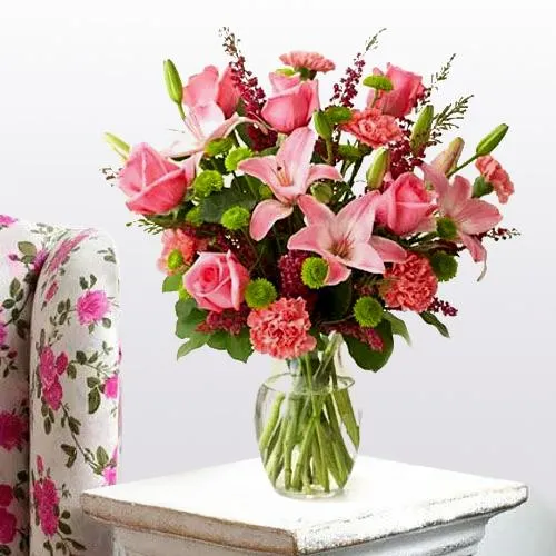 Pretty Arrangement of Lilies, Roses and Carnations with Pure Passion