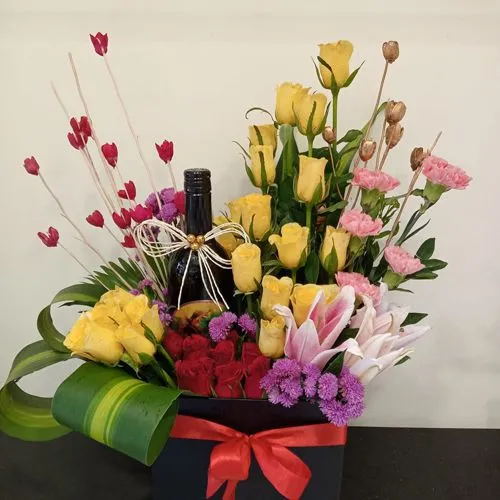 Gorgeous Mixed Flowers Box Arrangement with Sparkling Fruit Juice